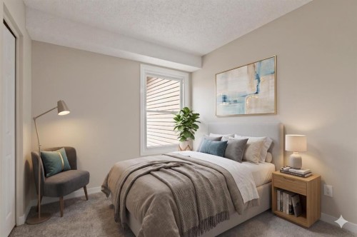 32 Deerpoint Road Se, Calgary, AB - Indoor Photo Showing Bedroom