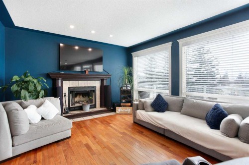 161 Panorama Hills View Nw, Calgary, AB - Indoor Photo Showing Living Room With Fireplace