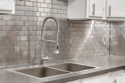 4 Cedarbrook Way Sw, Calgary, AB - Indoor Photo Showing Kitchen With Double Sink