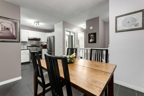 4 Cedarbrook Way Sw, Calgary, AB - Indoor Photo Showing Dining Room