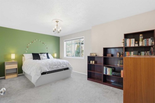 43 Everstone Place Sw, Calgary, AB - Indoor Photo Showing Bedroom