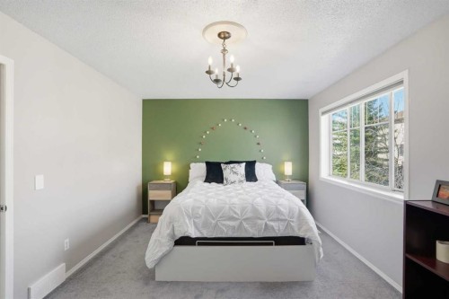 43 Everstone Place Sw, Calgary, AB - Indoor Photo Showing Bedroom