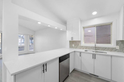 361 Martinwood Place Ne, Calgary, AB - Indoor Photo Showing Kitchen With Double Sink