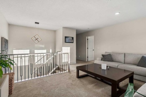 311 Chaparral Ravine View Se, Calgary, AB - Indoor Photo Showing Living Room