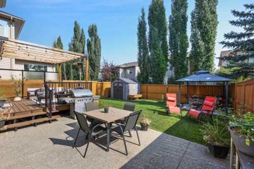 311 Chaparral Ravine View Se, Calgary, AB - Outdoor With Deck Patio Veranda With Backyard