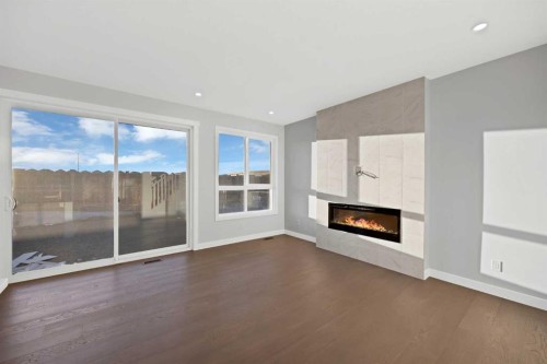 175 Homestead Common Ne, Calgary, AB - Indoor Photo Showing Living Room With Fireplace