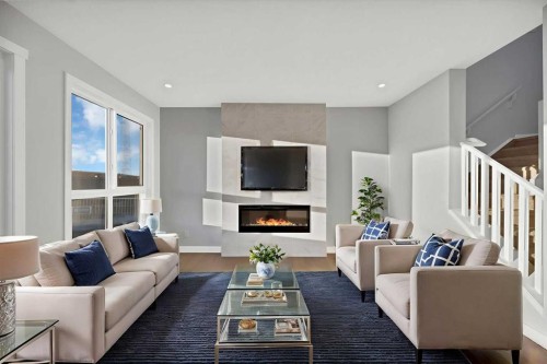 175 Homestead Common Ne, Calgary, AB - Indoor Photo Showing Living Room With Fireplace