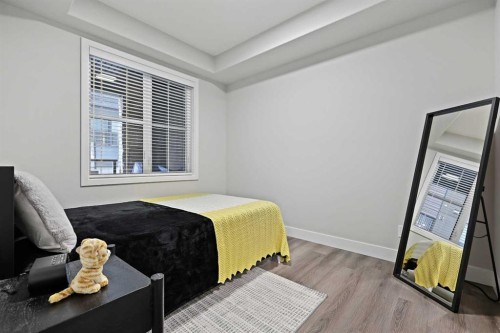 105-8355 19 Avenue Sw, Calgary, AB - Indoor Photo Showing Bedroom
