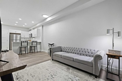 105-8355 19 Avenue Sw, Calgary, AB - Indoor Photo Showing Living Room