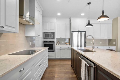 211-20 Seton Park Se, Calgary, AB - Indoor Photo Showing Kitchen With Stainless Steel Kitchen With Upgraded Kitchen