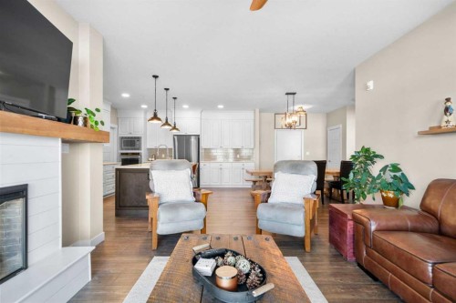 211-20 Seton Park Se, Calgary, AB - Indoor Photo Showing Living Room With Fireplace