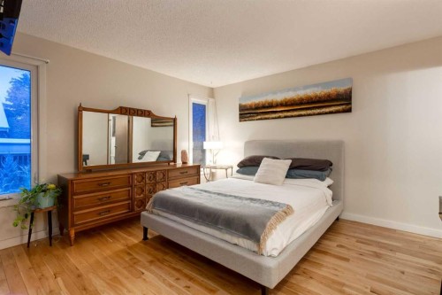 8 Deerwood Road Se, Calgary, AB - Indoor Photo Showing Bedroom