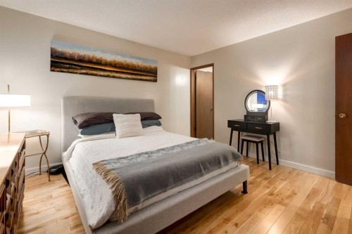 8 Deerwood Road Se, Calgary, AB - Indoor Photo Showing Bedroom