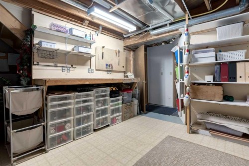 8 Deerwood Road Se, Calgary, AB - Indoor Photo Showing Basement