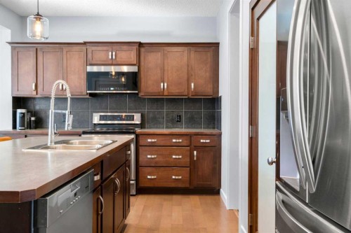 9 Sage Valley Park Nw, Calgary, AB - Indoor Photo Showing Kitchen With Stainless Steel Kitchen With Double Sink