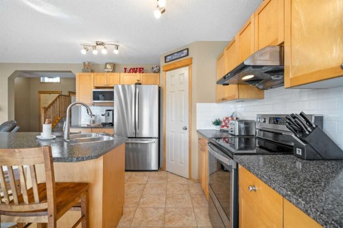 60 Cranfield Place Se, Calgary, AB - Indoor Photo Showing Kitchen With Double Sink With Upgraded Kitchen