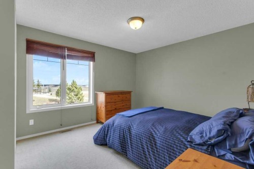 47 Cramond Green Se, Calgary, AB - Indoor Photo Showing Bedroom