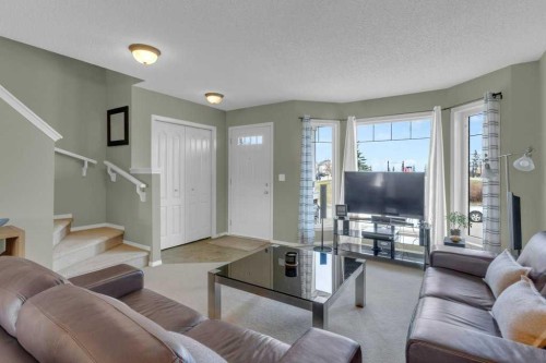 47 Cramond Green Se, Calgary, AB - Indoor Photo Showing Living Room