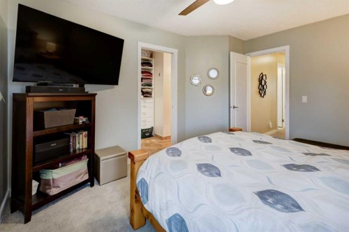 19 Riverstone Crescent Se, Calgary, AB - Indoor Photo Showing Bedroom