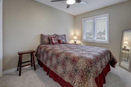 19 Riverstone Crescent Se, Calgary, AB - Indoor Photo Showing Bedroom