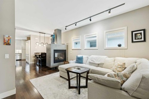 2231 26 Avenue Sw, Calgary, AB - Indoor Photo Showing Living Room With Fireplace