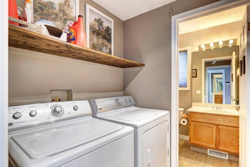 116 Macewan Ridge Close Nw, Calgary, AB - Indoor Photo Showing Laundry Room