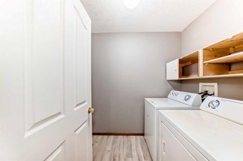 11-33 Stonegate Drive Nw, Airdrie, AB - Indoor Photo Showing Laundry Room