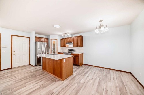 11-33 Stonegate Drive Nw, Airdrie, AB - Indoor Photo Showing Kitchen