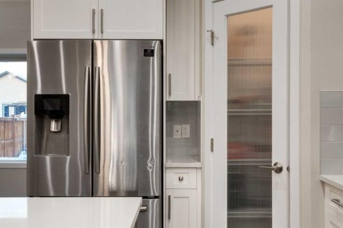 123 Drake Landing Loop, Okotoks, AB - Indoor Photo Showing Kitchen