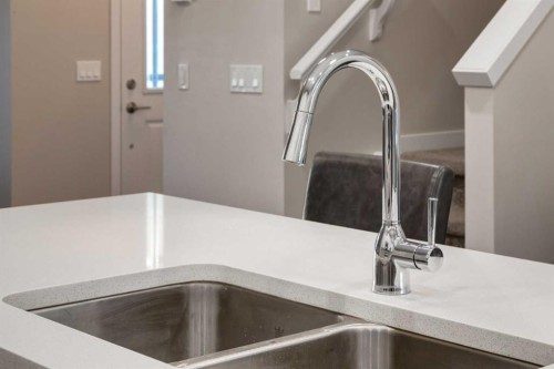 123 Drake Landing Loop, Okotoks, AB - Indoor Photo Showing Kitchen With Double Sink