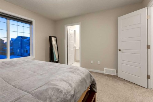 123 Drake Landing Loop, Okotoks, AB - Indoor Photo Showing Bedroom