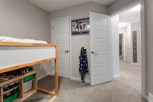 123 Drake Landing Loop, Okotoks, AB - Indoor Photo Showing Other Room