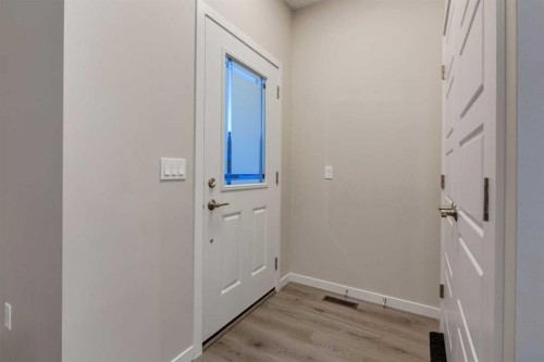 123 Drake Landing Loop, Okotoks, AB - Indoor Photo Showing Other Room
