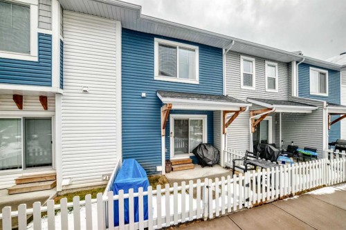 1302 Jumping Pound Common, Cochrane, AB - Outdoor With Deck Patio Veranda With Exterior