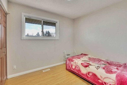 1004 Penrith Crescent Se, Calgary, AB - Indoor Photo Showing Bedroom