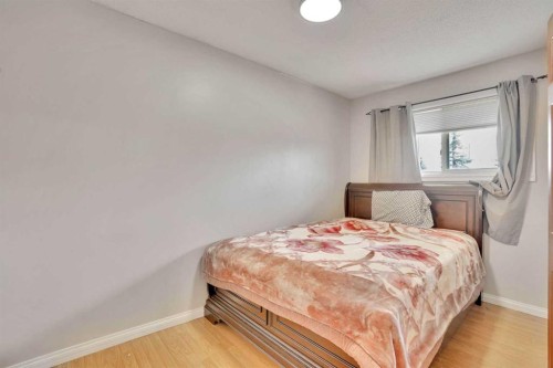 1004 Penrith Crescent Se, Calgary, AB - Indoor Photo Showing Bedroom