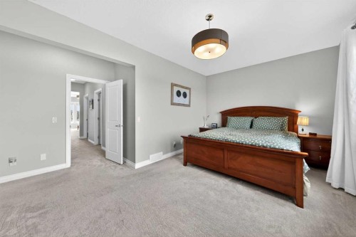 396 Evansborough Way Nw, Calgary, AB - Indoor Photo Showing Bedroom