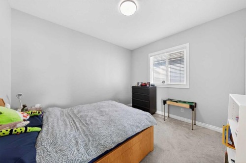 396 Evansborough Way Nw, Calgary, AB - Indoor Photo Showing Bedroom