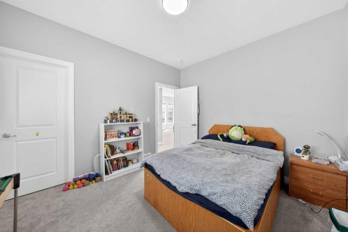 396 Evansborough Way Nw, Calgary, AB - Indoor Photo Showing Bedroom