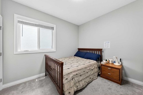 396 Evansborough Way Nw, Calgary, AB - Indoor Photo Showing Bedroom