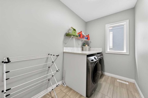 396 Evansborough Way Nw, Calgary, AB - Indoor Photo Showing Laundry Room