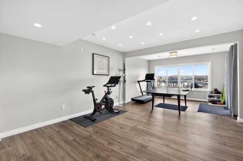 396 Evansborough Way Nw, Calgary, AB - Indoor Photo Showing Gym Room