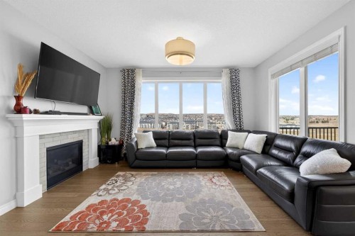 396 Evansborough Way Nw, Calgary, AB - Indoor Photo Showing Living Room With Fireplace