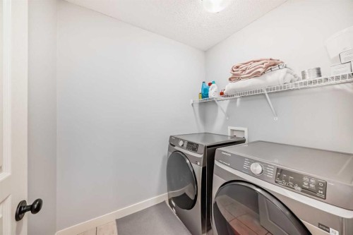 73 Cranleigh Heath Se, Calgary, AB - Indoor Photo Showing Laundry Room