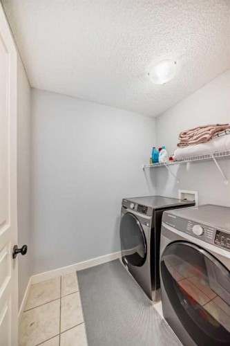 73 Cranleigh Heath Se, Calgary, AB - Indoor Photo Showing Laundry Room