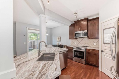 73 Cranleigh Heath Se, Calgary, AB - Indoor Photo Showing Kitchen With Double Sink With Upgraded Kitchen