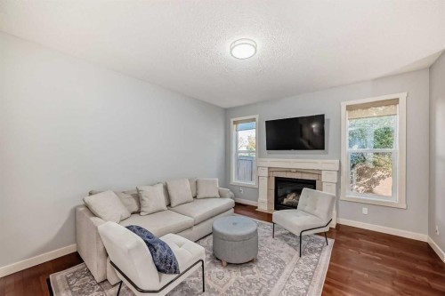 73 Cranleigh Heath Se, Calgary, AB - Indoor Photo Showing Living Room With Fireplace