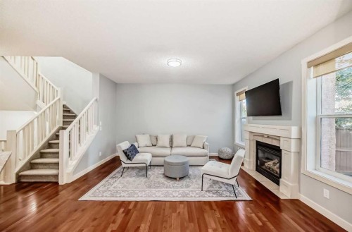 73 Cranleigh Heath Se, Calgary, AB - Indoor Photo Showing Living Room With Fireplace