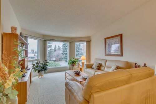 8 Douglas Woods View Se, Calgary, AB - Indoor Photo Showing Living Room
