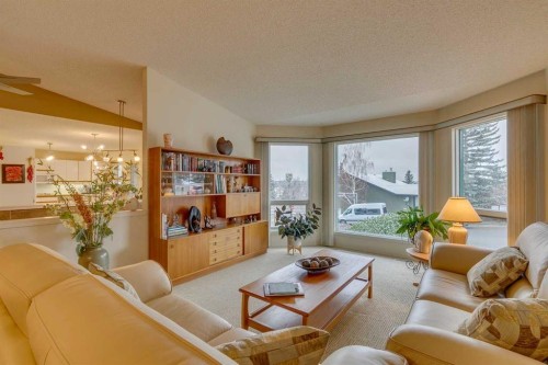 8 Douglas Woods View Se, Calgary, AB - Indoor Photo Showing Living Room